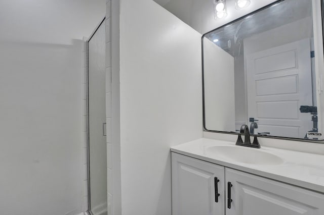 bathroom featuring vanity and walk in shower