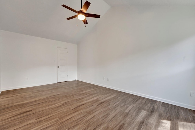 unfurnished room featuring dark hardwood / wood-style floors, high vaulted ceiling, and ceiling fan