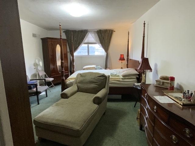 bedroom with dark carpet