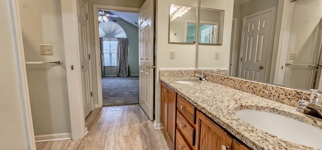 bathroom with vanity and ceiling fan