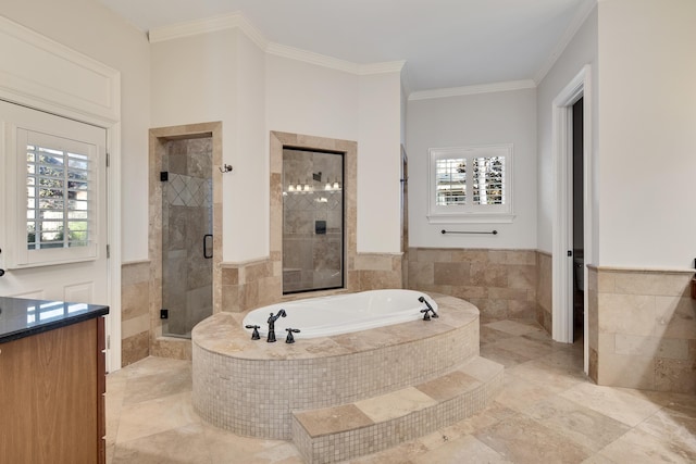 bathroom featuring vanity, independent shower and bath, a wealth of natural light, and crown molding