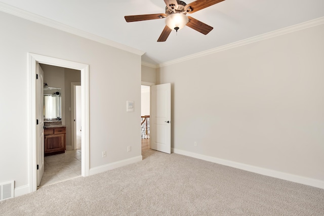 unfurnished bedroom with light carpet, ensuite bathroom, ceiling fan, and ornamental molding