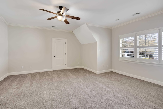 additional living space with carpet and ceiling fan