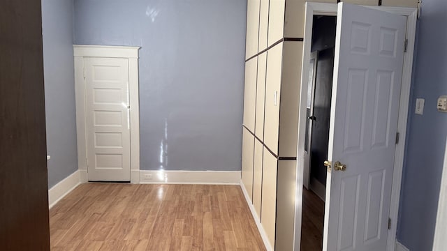 hall featuring light hardwood / wood-style flooring