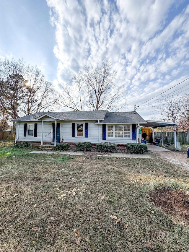 single story home featuring a carport