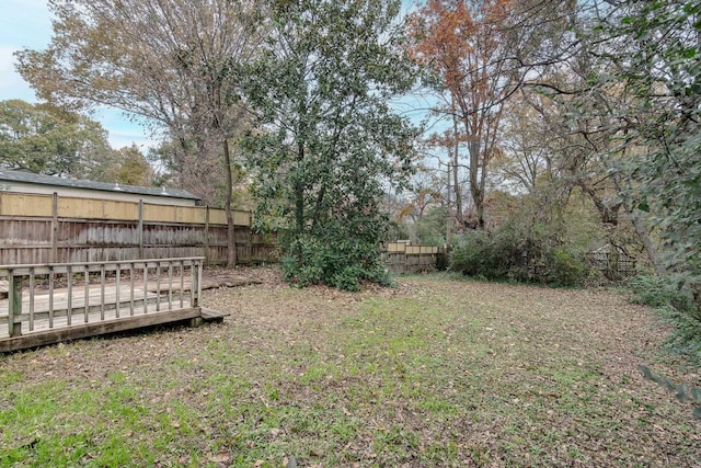 view of yard featuring a deck