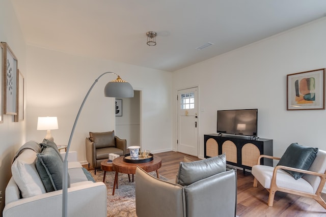 living room with hardwood / wood-style flooring