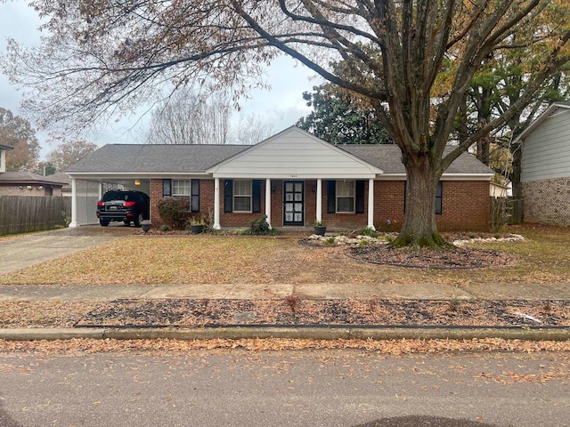 view of front of property featuring a carport