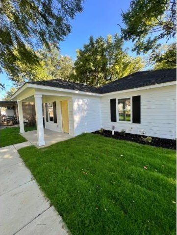 exterior space with a lawn