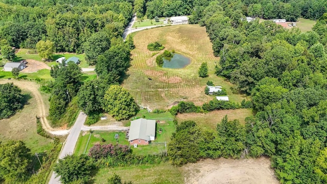 aerial view with a rural view and a water view