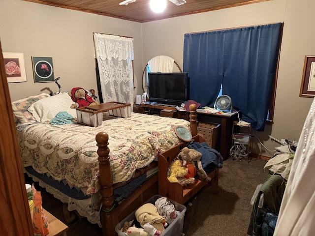 carpeted bedroom with ceiling fan and wooden ceiling