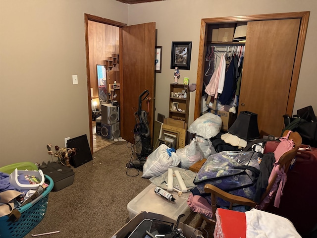 carpeted bedroom featuring a closet