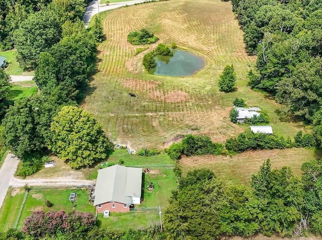 drone / aerial view with a rural view and a water view