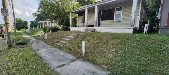 view of home's exterior with covered porch