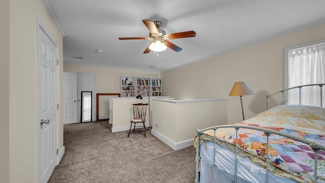 bedroom with ceiling fan, light colored carpet, and crown molding