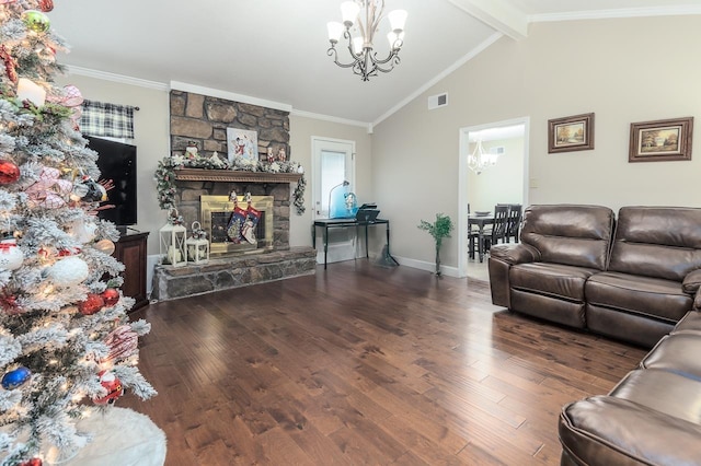 living room with a stone fireplace, dark hardwood / wood-style floors, ornamental molding, a notable chandelier, and beam ceiling