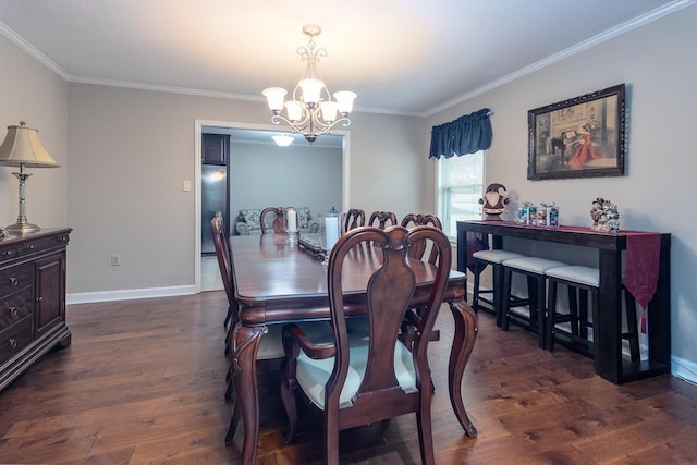 dining area featuring dark hardwood / wood-style floors and crown molding