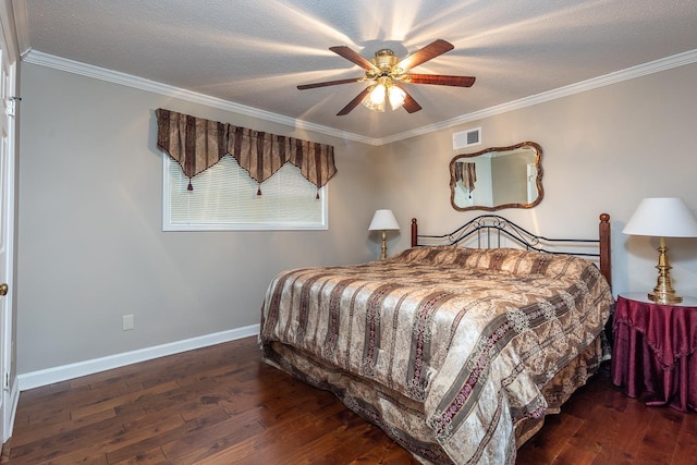 bedroom featuring a textured ceiling, dark hardwood / wood-style flooring, ceiling fan, and crown molding