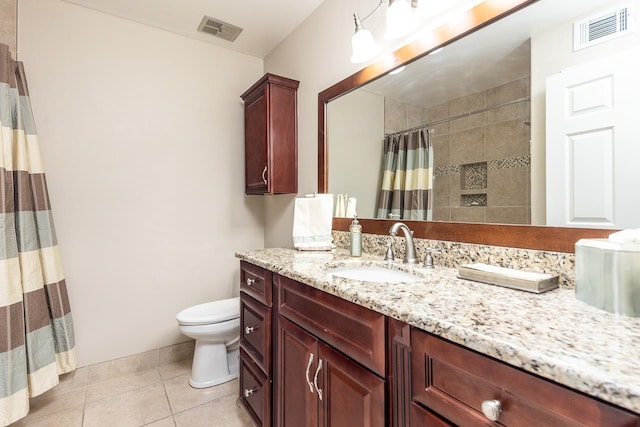 bathroom featuring tile patterned flooring, vanity, toilet, and a shower with shower curtain