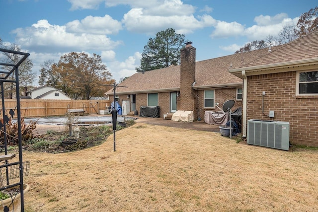 view of yard featuring cooling unit and a patio area