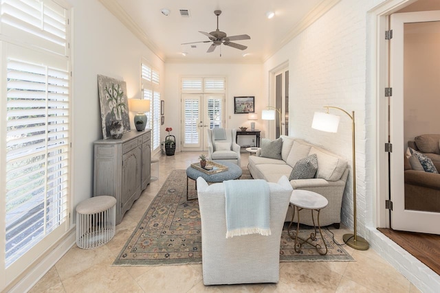 living room featuring ceiling fan, light tile patterned flooring, ornamental molding, and french doors