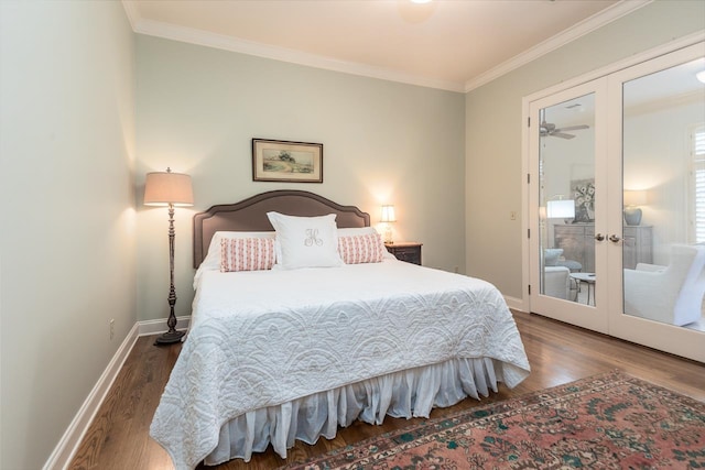 bedroom featuring french doors, dark hardwood / wood-style floors, and ornamental molding