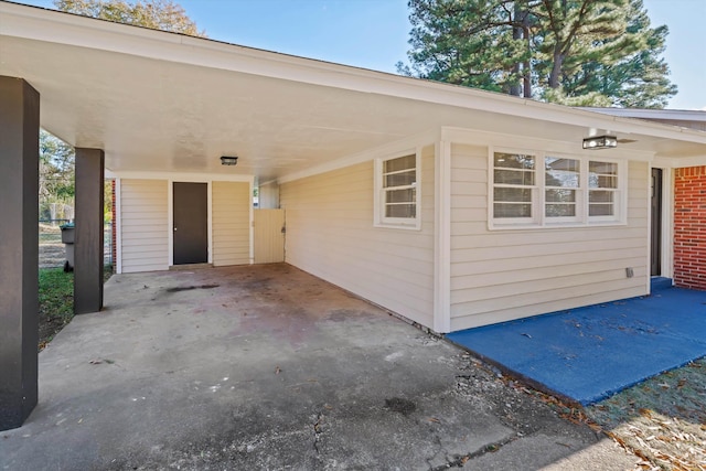 view of patio / terrace featuring a carport