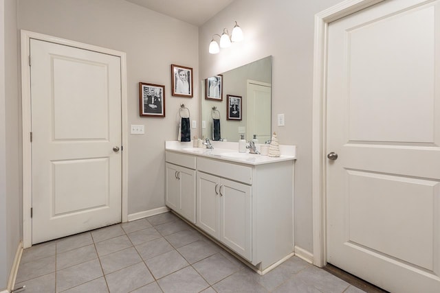 bathroom featuring vanity and tile patterned flooring