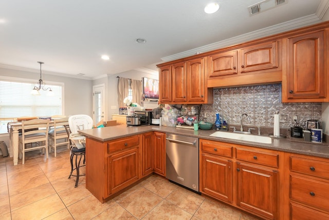 kitchen featuring dishwasher, sink, crown molding, decorative light fixtures, and kitchen peninsula