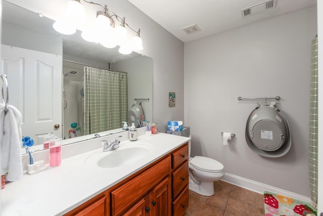 bathroom with tile patterned flooring, a shower with curtain, toilet, and vanity