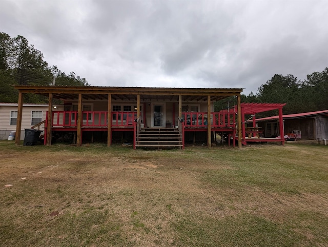 exterior space with a deck and a front lawn