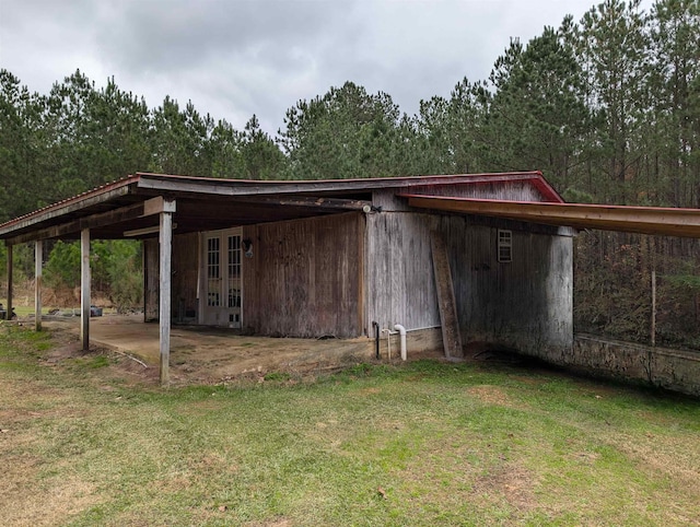 view of outdoor structure with french doors