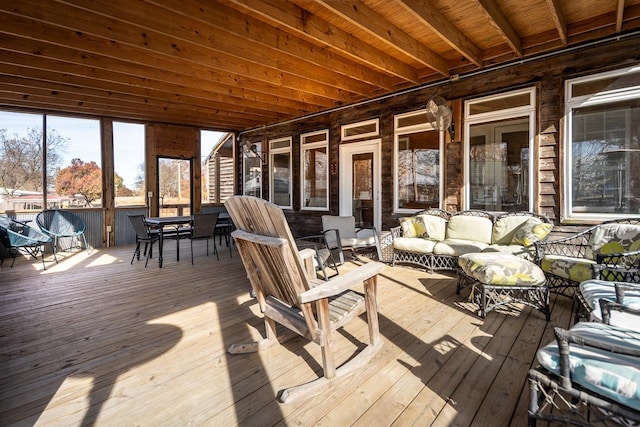 wooden terrace featuring an outdoor living space