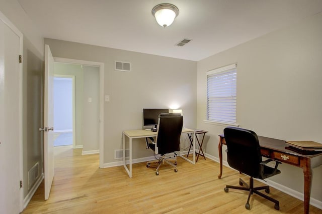 office area featuring light wood-type flooring