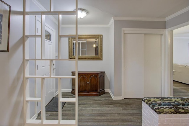 bedroom featuring a closet, wood-type flooring, and ornamental molding