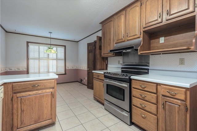 kitchen featuring pendant lighting, light countertops, brown cabinetry, stainless steel range with electric stovetop, and under cabinet range hood