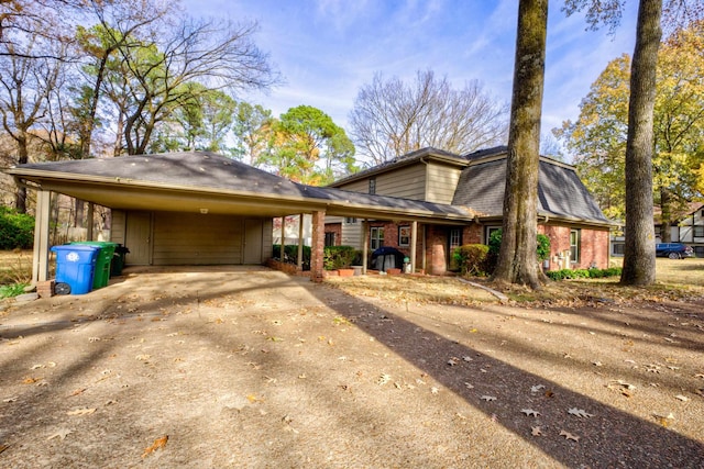 view of front of property with a carport