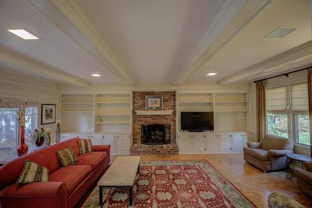 living room featuring built in shelves, beamed ceiling, a fireplace, light parquet flooring, and ornamental molding