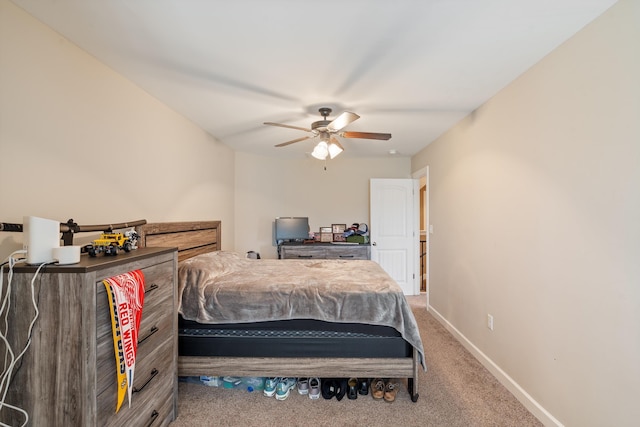 bedroom with ceiling fan and carpet