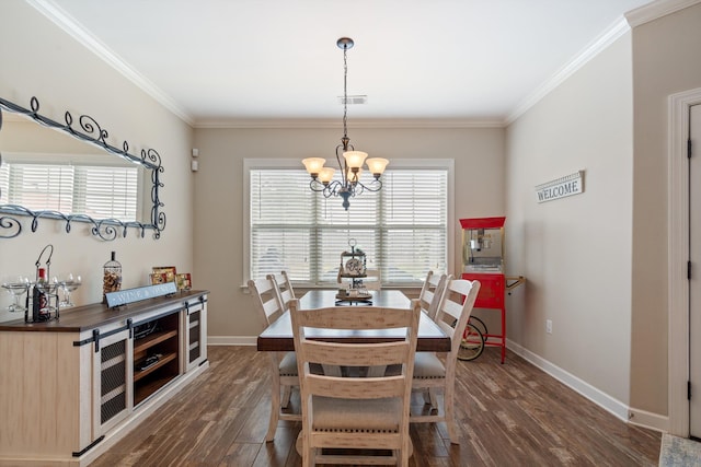 dining room featuring dark hardwood / wood-style flooring, ornamental molding, plenty of natural light, and an inviting chandelier