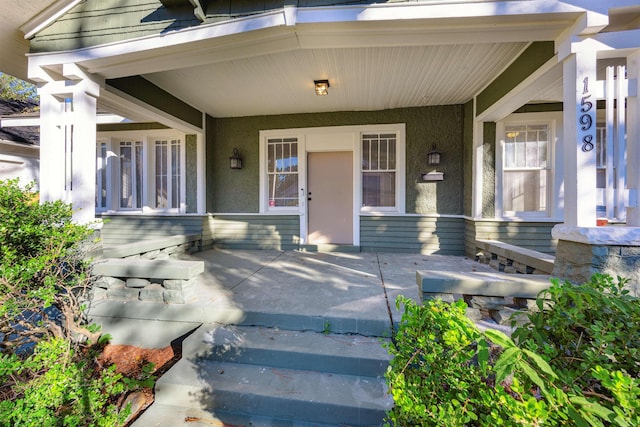 entrance to property with a porch