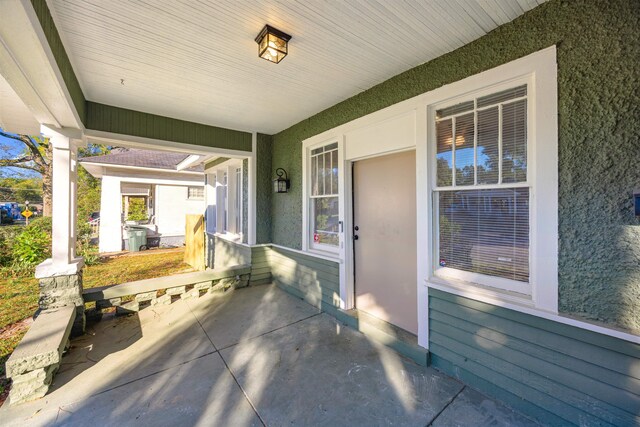 view of patio featuring a porch