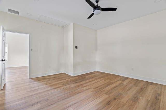 unfurnished room featuring ceiling fan and light wood-type flooring