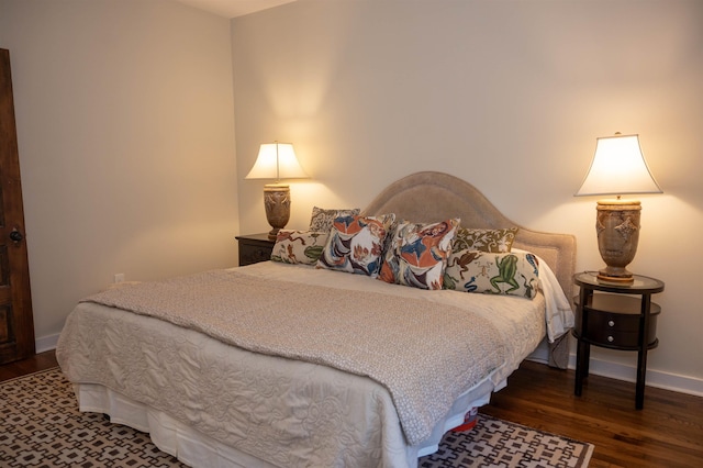 bedroom featuring dark hardwood / wood-style floors