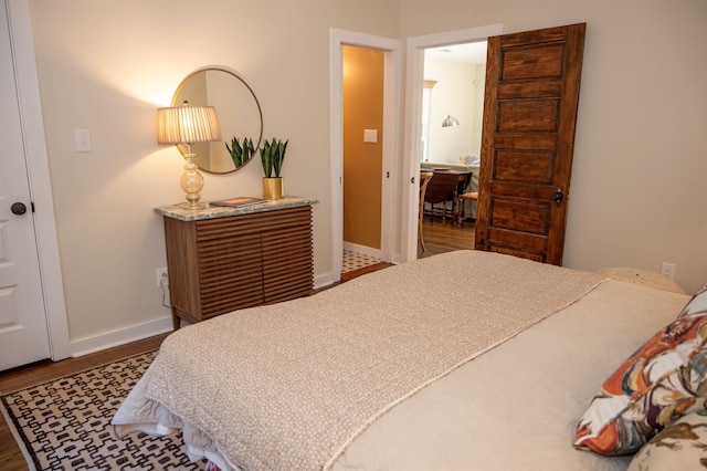 bedroom featuring wood-type flooring