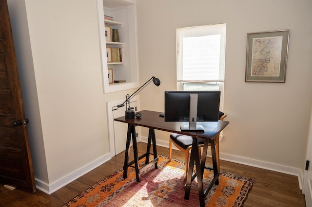 office area with dark hardwood / wood-style floors