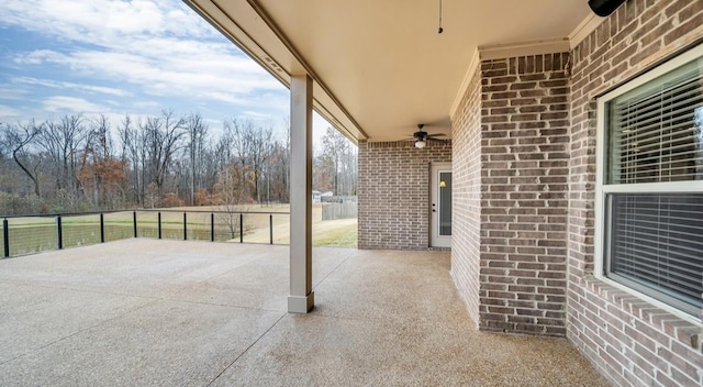 view of patio with ceiling fan