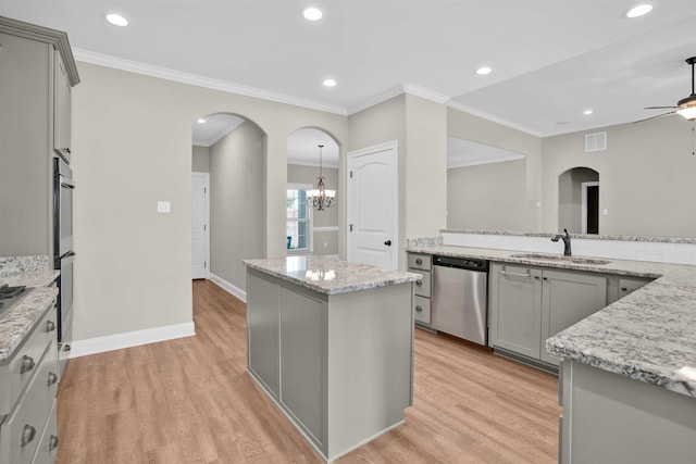 kitchen with gray cabinets, sink, light hardwood / wood-style flooring, and appliances with stainless steel finishes