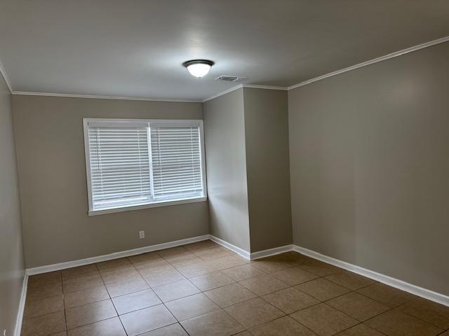 empty room with crown molding