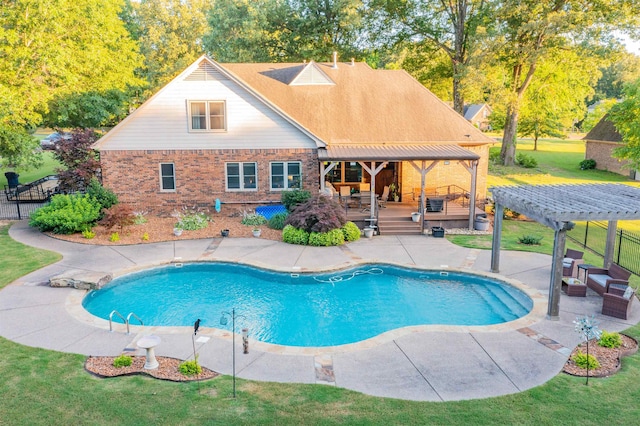 view of swimming pool featuring a pergola, a patio, and a deck